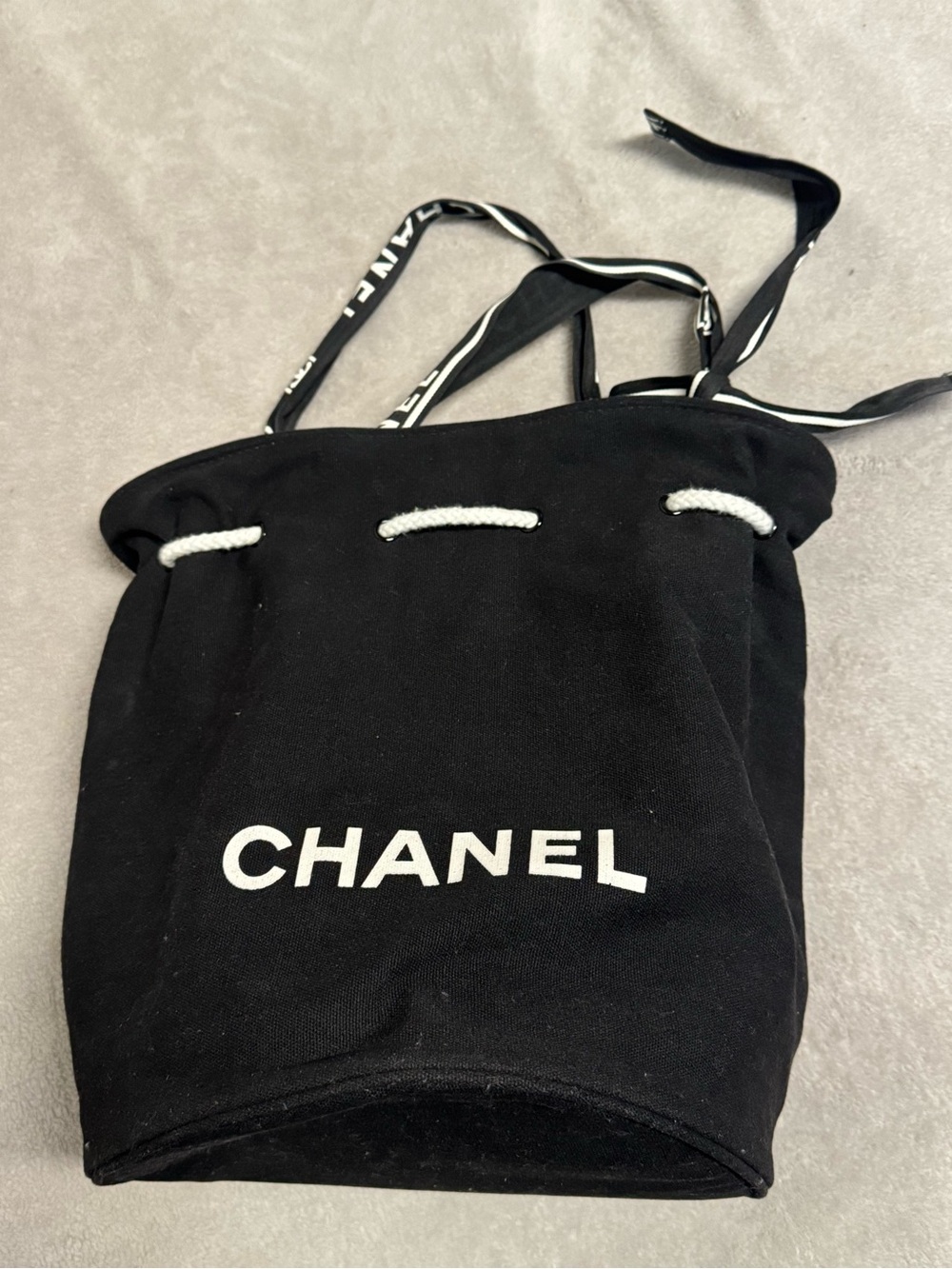 CHANEL Black Canvas Drawstring Tote with White Logo